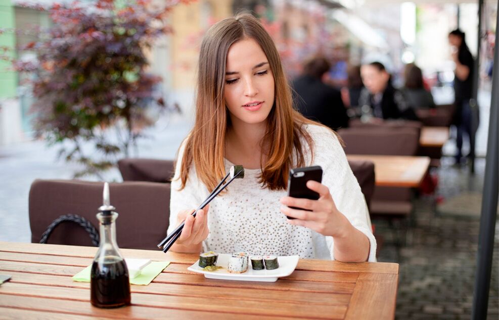 Distracted while eating, the girl ate more than she needed